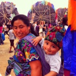 A Guatemalan mother and son at the Sumpango Kite Festival.